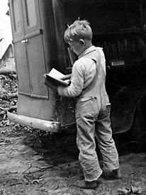 A child from Winn Parish, La., visits the bookmobile in 1938.  Books were rare in rural parishes until Huey Long's statewide initiatives to educate the rural poor.